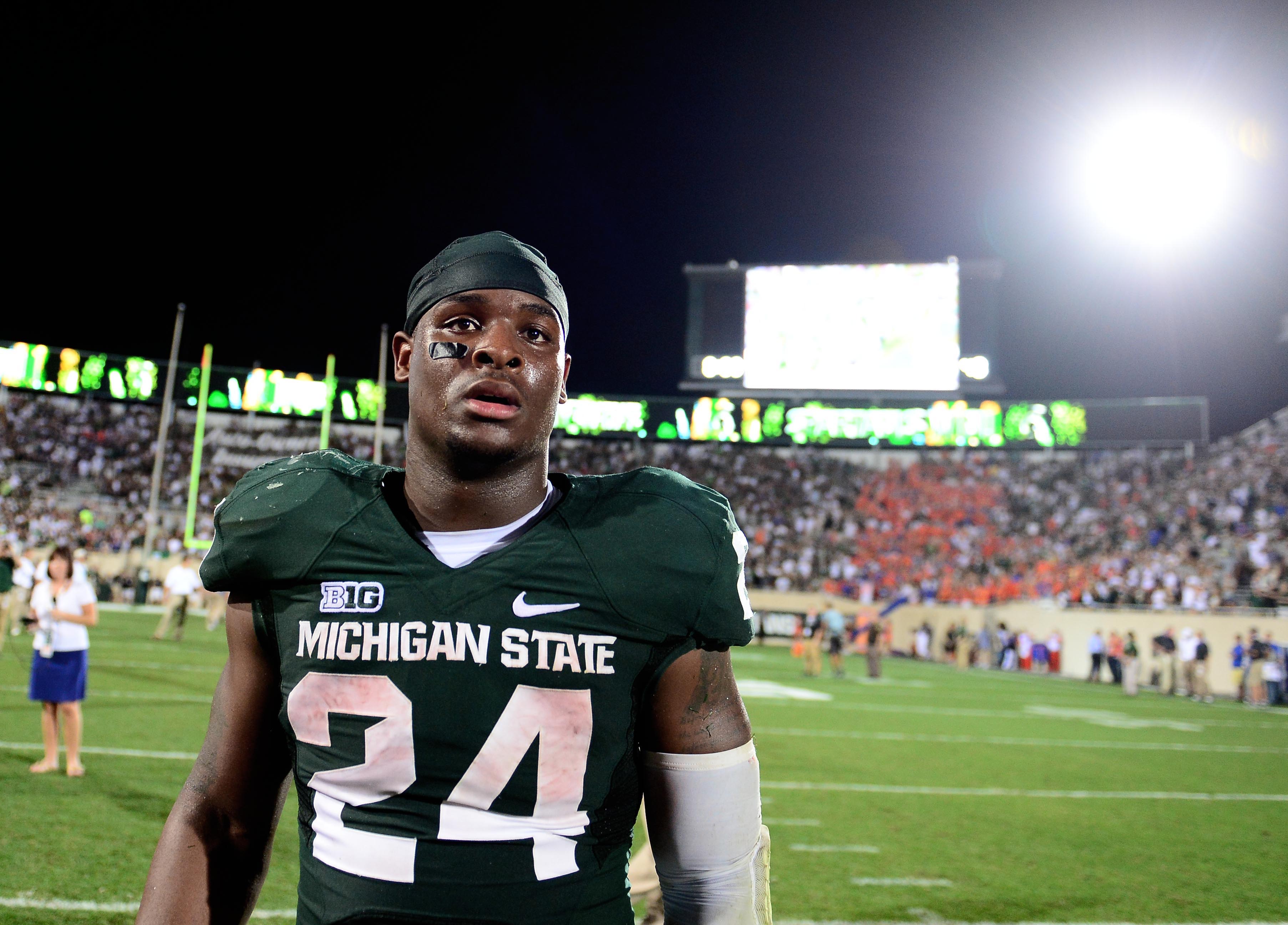 Michigan State DE William Gholston signs BTN tour bus - Big Ten Network