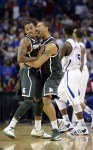 Nov 13, 2012; Atlanta, GA, USA; Michigan State Spartans guard Keith Appling (11) celebrates with Denzel Valentine (45) as the Psartans defeated the Kansas Jayhawks 67-64 in the 2012 Champions Classic at the Georgia Dome. Mandatory Credit: Paul Abell-US PRESSWIRE