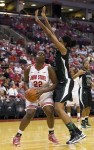 November 25, 2012; Columbus, OH, USA; Ohio State Buckeyes center Darryce Moore (22) looks for room to shoot as Wright State Raiders center Teonia McCune (53) defends at Value City Arena. Mandatory Credit: Greg Bartram-US PRESSWIRE