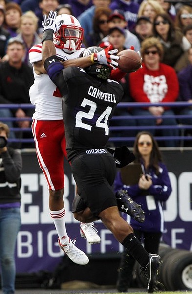 Oct 20, 2012; Evanston, IL, USA; Northwestern Wildcats defensive back Ibraheim Campbell (24) breaks up a pass intended for Nebraska Cornhuskers wide receiver Jamal Turner (10) in the end zone during the first quarter at Ryan Field. Mandatory Credit: Jerry Lai-US PRESSWIRE