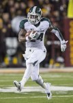 Nov 24, 2012; Minneapolis, MN, USA: Michigan State Spartans running back Le'Veon Bell (24) runs for a first down in the second half against the Minnesota Golden Gophers at TCF Bank Stadium. Michigan State won 26-10. Mandatory Credit: Jesse Johnson-US PRESSWIRE