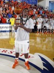 Nov 21, 2012; Lahaina, HI, USA; Illinois Fighting Illini guard Brandon Paul (3) holds up the tournament MVP trophy after defeating the Butler Bulldogs during the 2012 EA SPORTS Maui Invitational championship game at the Lahaina Civic Center. Illinois defeated Butler 78-61. Mandatory Credit: Brian Spurlock-US PRESSWIRE