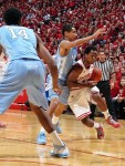 Nov 27, 2012; Bloomington, IN, USA; Indiana Hoosiers guard Yogi Ferrell (11) drives to the basket against North Carolina Tar Heels guard Marcus Paige (5) at Assembly Hall. Mandatory Credit: Brian Spurlock-US PRESSWIRE