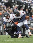 Nov 24, 2011; Evanston, IL, USA; Northwestern Wildcats cornerback C.J. Bryant (13) causes a fumble by Illinois Fighting Illini defensive back Justin Green (26) on a kickoff during the first half at Ryan Field. Mandatory Credit: David Banks-US PRESSWIRE