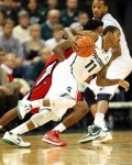 November 25, 2012; East Lansing, MI, USA; Michigan State Spartans guard Keith Appling (11) drives to the basket against Louisiana Lafayette Ragin Cajuns guard Elfrid Payton (2) during the first half of a game at Jack Breslin Students Events Center. Mandatory Credit: Mike Carter-US PRESSWIRE