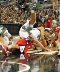 November 25, 2012; East Lansing, MI, USA; Michigan State Spartans guard Brandan Kearney (3), center Adreian Payne (5) and Louisiana Lafayette Ragin Cajuns guard Steven Wronkoski (4) fight for a loose ball during the first half of a game at Jack Breslin Students Events Center. Mandatory Credit: Mike Carter-US PRESSWIRE