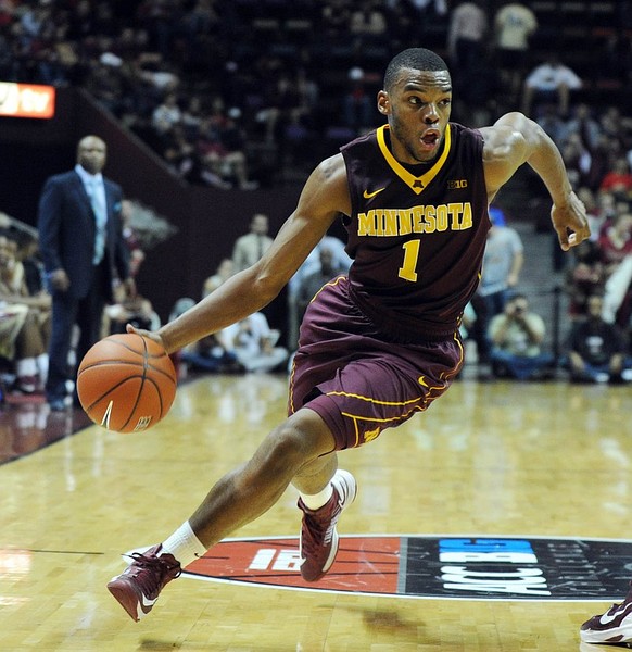 Nov 27, 2012; Tallahassee, FL, USA; Minnesota Golden Gophers guard Andre Hollins (1) moves the ball down the court during the game against the Florida State Seminoles at the Donald L. Tucker Center. Mandatory Credit: Melina Vastola-US PRESSWIRE