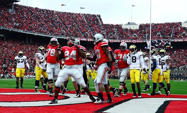 Nov 24, 2012; Columbus, OH, USA; Ohio State Buckeyes running back Carlos Hyde (34) celebrates after scoring a touchdown in the first quarter against the Michigan Wolverines at Ohio Stadium. Mandatory Credit: Andrew Weber-US PRESSWIRE