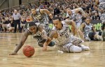 Nov 9, 2012; Ramstein, GERMANY; Connecticut Huskies guard Shabazz Napier (13) dives for the ball against Michigan State Spartans guard Branden Dawson (22) during the game at Ramstein Air Base. Mandatory Credit: Martin Goldhahn/View via US PRESSWIRE