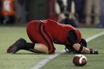 Sep 29, 2012; Lincoln, NE, USA; Nebraska Cornhuskers linebacker Will Compton (51) puts his head on the turf after dropping an interception against the Wisconsin Badgers in the first half at Memorial Stadium. Nebraska won 30-27. Mandatory Credit: Bruce Thorson-US PRESSWIRE