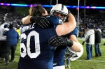 November 24, 2012; University Park, PA, USA; Penn State Nittany Lions running back Michael Zordich (9) celebrates with center Ty Howle (60) after beating the Wisconsin Badgers 24-21 at Beaver Stadium. Mandatory Credit: Evan Habeeb-US PRESSWIRE