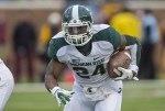 Nov 24, 2012; Minneapolis, MN, USA: Michigan State Spartans running back Le'Veon Bell (24) runs for a first down in the first half against the Minnesota Golden Gophers at TCF Bank Stadium. Mandatory Credit: Jesse Johnson-US PRESSWIRE