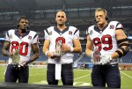 November 22, 2012; Detroit, MI, USA; Houston Texans wide receiver Andre Johnson (80) , quarterback Matt Schaub (8) and defensive end J.J. Watt (99) with Phil Simms award after the game against the Detroit Lions on Thanksgiving at Ford Field. Texans won 34-31. Mandatory Credit: Mike Carter-US PRESSWIRE