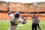 Sep 1, 2012; Syracuse, NY, USA; Northwestern Wildcats wide receiver Demetrius Fields (8) reacts after scoring a touchdown in the fourth quarter against the Syracuse Orange at the Carrier Dome. Mandatory Credit: Rich Barnes-US PRESSWIRE