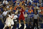 November 14, 2012; Gainesville, FL, USA; Wisconsin Badgers guard/forward Ryan Evans (5) shoots as Florida Gators guard Michael Frazier II (20) defends during the first half at the Stephen C. O'Connell Center. Mandatory Credit: Kim Klement-US PRESSWIRE
