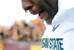 Sep 8, 2012; Mt. Pleasant, MI, USA; Michigan State Spartans guard Donavon Clark (76) gets a nose bleed prior to the game against the Central Michigan Chippewas at Kelly/Shorts Stadium. Mandatory Credit: Andrew Weber-US Presswire