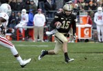 November 24, 2012; West Lafayette, IN, USA; Purdue Boilermakers quarterback Rob Henry (15) runs past Indiana Hoosiers cornerback Brian Williams (7) during the game at Ross Ade Stadium. Mandatory Credit: Sandra Dukes-US PRESSWIRE