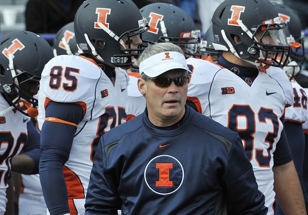Nov 24, 2011; Evanston, IL, USA; Illinois Fighting Illini head coach Tim Beckman leads his team to the field before the game against the Northwestern Wildcats at Ryan Field. Mandatory Credit: David Banks-US PRESSWIRE
