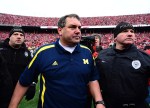 Nov 24, 2012; Columbus, OH, USA; Michigan Wolverines head coach Brady Hoke is escorted off the field after losing to Ohio State Buckeyes 26-21 at Ohio Stadium. Mandatory Credit: Andrew Weber-US PRESSWIRE