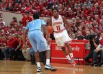 Nov 27, 2012; Bloomington, IN, USA; Indiana Hoosiers guard Yogi Ferrell (11) is guarded by North Carolina Tar Heels guard Dexter Strickland (1) at Assembly Hall. Mandatory Credit: Brian Spurlock-US PRESSWIRE