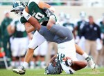 September 22, 2012; East Lansing, MI, USA; Eastern Michigan Eagles tight end Tyreese Russell (88) make a catch against Michigan State Spartans linebacker Max Bullough (40) during 2nd half of a game at Spartan Stadium. MSU won 23-7. Mandatory Credit: Mike Carter-US PRESSWIRE