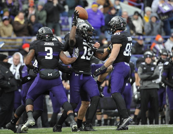 Nov 24, 2011; Evanston, IL, USA; Northwestern Wildcats wide receiver Cameron Dickerson (19) celebrates a fumble recovery on a kickoff against the Illinois Fighting Illini during the first half at Ryan Field. Mandatory Credit: David Banks-US PRESSWIRE