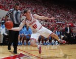 Nov 27, 2012; Bloomington, IN, USA; Indiana Hoosiers forward Cody Zeller (40) saves the ball from going out of bounds against the North Carolina Tar Heels forward Joel James (0) at Assembly Hall. Mandatory Credit: Brian Spurlock-US PRESSWIRE