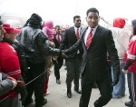 November 24, 2012; Columbus, OH, USA; Ohio State Buckeyes quarterback Braxton Miller (5) shakes hands with fans on his way into the stadium before the game against the Michigan Wolverines at Ohio Stadium. Mandatory Credit: Greg Bartram-US PRESSWIRE