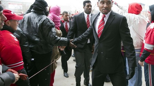 November 24, 2012; Columbus, OH, USA; Ohio State Buckeyes quarterback Braxton Miller (5) shakes hands with fans on his way into the stadium before the game against the Michigan Wolverines at Ohio Stadium. Mandatory Credit: Greg Bartram-US PRESSWIRE