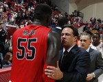 Nov 25, 2012; Bloomington, IN, USA; Indiana Hoosiers coach Tom Crean greets Ball State Cardinals forward Majok Majok (55) after the game at Assembly Hall. Mandatory Credit: Brian Spurlock-US PRESSWIRE