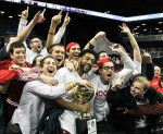 Nov. 20, 2012; Brooklyn, NY, USA; Indiana Hoosiers forward Christian Watford (center) holds the trophy with fans after defeating the Georgetown Hoyas 82-72 at the Legends Classic Championship at Barclays Center. Mandatory Credit: Debby Wong-US PRESSWIRE