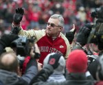 November 24, 2012; Columbus, OH, USA; Ohio State Buckeyes former coach Jim Tressel is held by players from his 2002 National Championship team in a game against the Michigan Wolverines at Ohio Stadium. Mandatory Credit: Greg Bartram-US PRESSWIRE