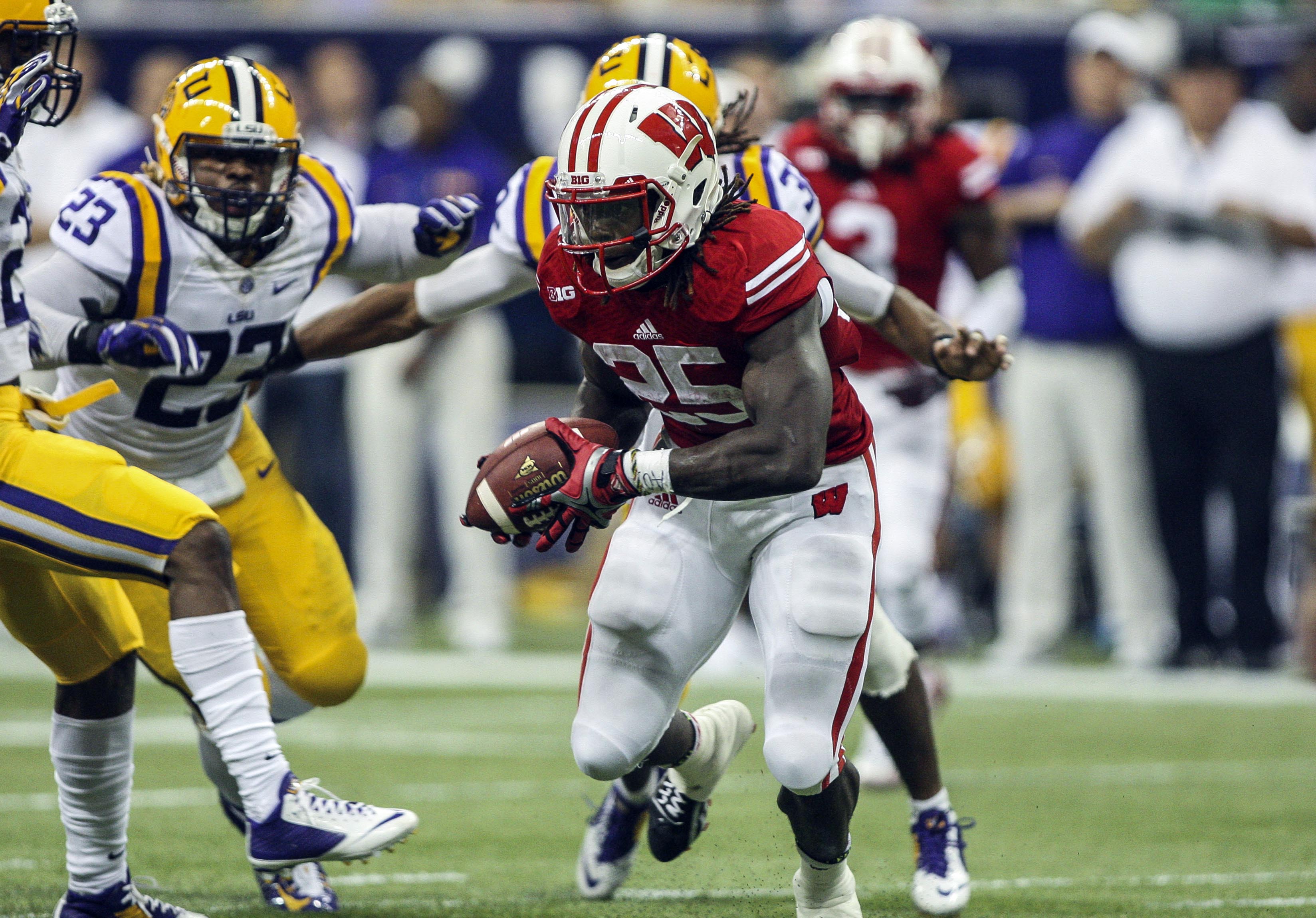 LSU scores final 21 points to rally past Wisconsin, 2824, in opener