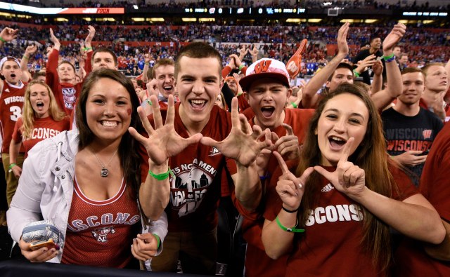 Apr 4, 2015; Indianapolis, IN, USA; Wisconsin Badgers fans cheer before the 2015 NCAA Men's Division I Championship semi-final game against the Kentucky Wildcats at Lucas Oil Stadium. Mandatory Credit: Bob Donnan-USA TODAY Sports