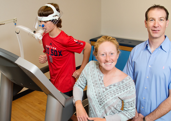 Chaddock-Heyman (center) and Illinois kinesiology and community health professor Charles Hillman with one of the study's participants.