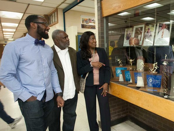 Malcolm Jenkins (left) with his parents Lee and Gwendolyn