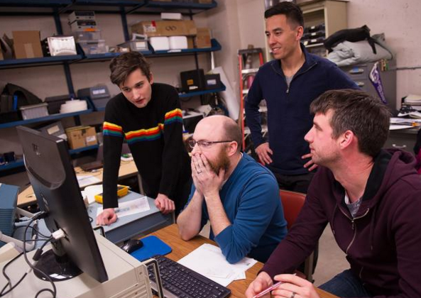 McCoy, far left, with colleagues at Iowa