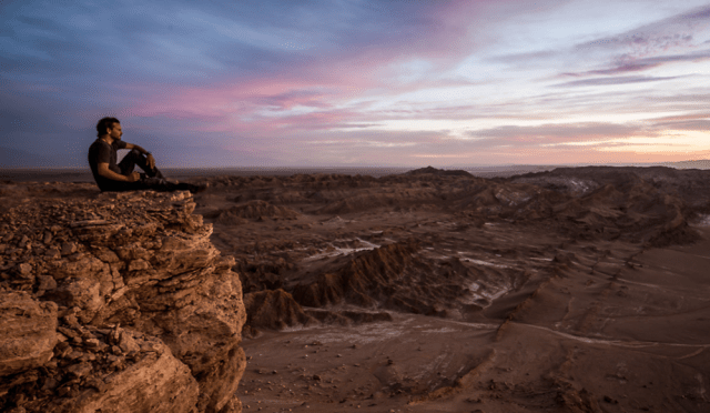 Doering soaking up a sunset in the Atacama Desert in South America