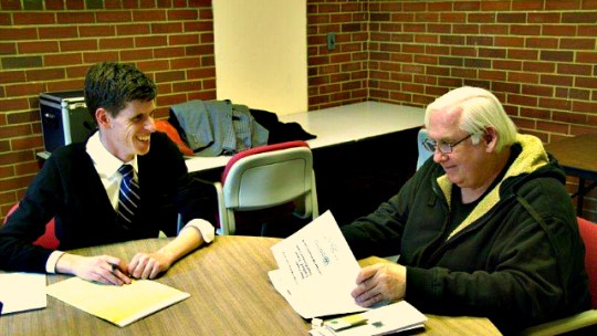 University of Wisconsin Veterans Law Center volunteer helping a client