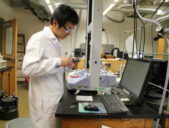 A student researcher working in the University of Minnesota Sustainable Polymers lab.