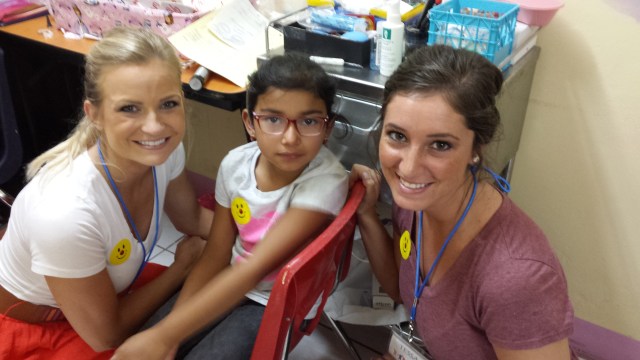 University of Nebraska audiology students with a young Nicaraguan patient