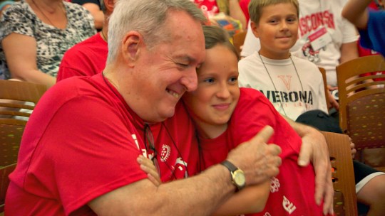 Students embrace at the University of Wisconsin's Grandparents University
