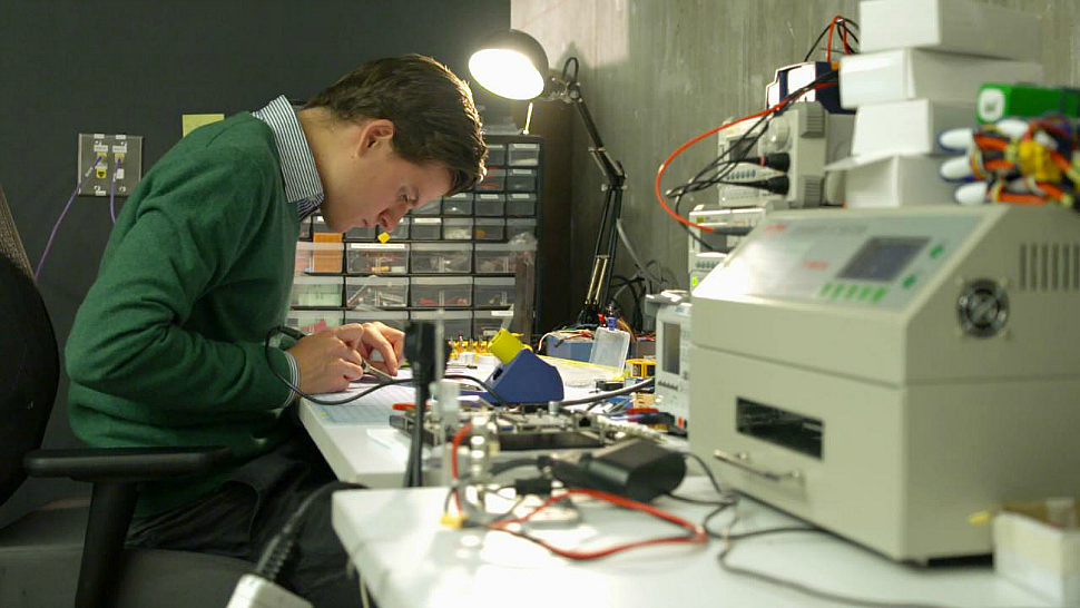 A student works in Northwestern University's Garage incubator space.