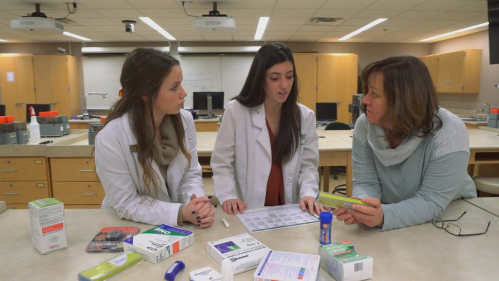 Purdue University pharmacy students and professor Karen Hudmon use the Rx for Change tobacco cessation curriculum