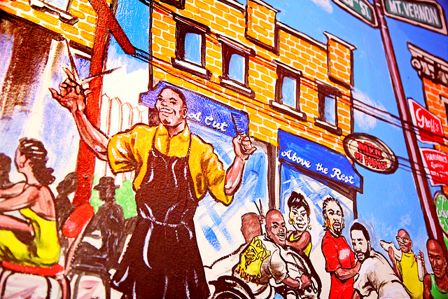 A mural in A Cut Above The Rest barbershop