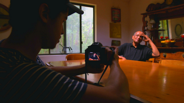 Penn State grad Jeremy Dennis photographs his relative, the noted photographer Herbert Randall