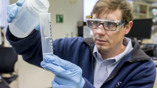 A researcher at Shedd Aquarium conducts tests as part of the Microbiome Project.