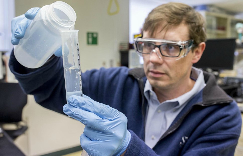 A researcher at Shedd Aquarium conducts tests as part of the Microbiome Project.