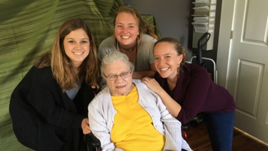 at The Better Day Club with one of our participants. Clockwise from left: Zoe Schrader, Anna Lubbers (both students), Dr. Jennie Gubner, and Joy.