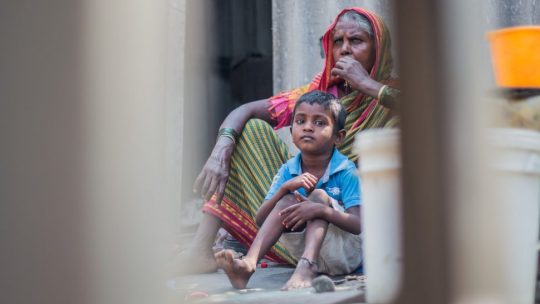 Grandmother with a child in India